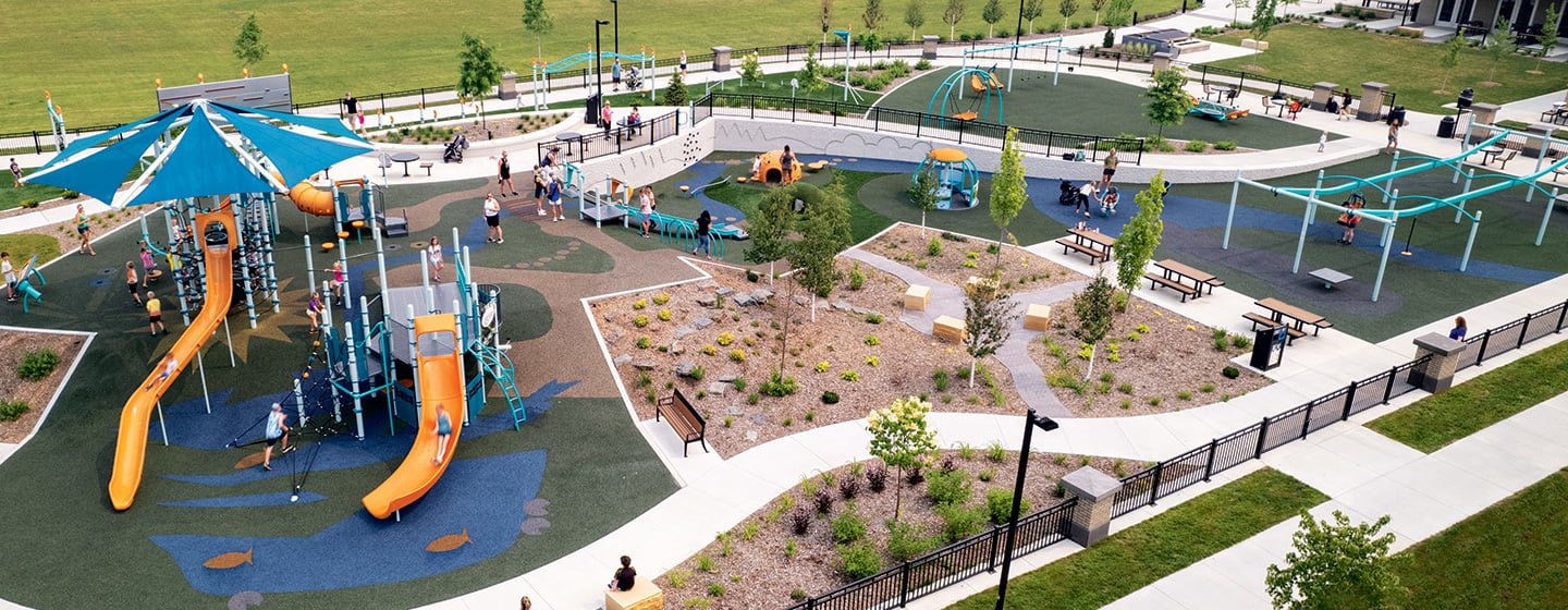 Wide image of a sprawling commercial park playground from Landscape Structures
