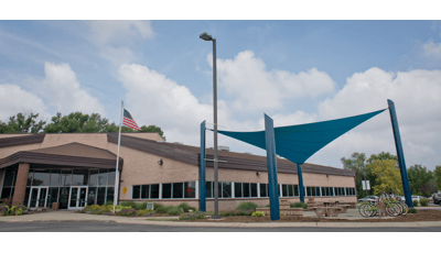 A custom SkyWays shade product installed for Greenwood Community Center designed to block up to 97 percent of the sun's UV rays.